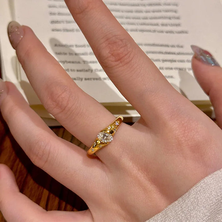 Sparkling Ellipse Zircon Ring