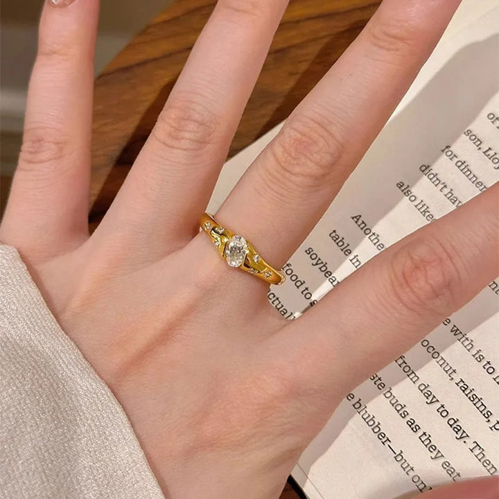 Sparkling Ellipse Zircon Ring